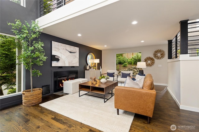 18510 NE 15th Pl, Bellevue, WA 98008 - living room with a fireplace, wood finished floors, recessed lighting, and baseboards