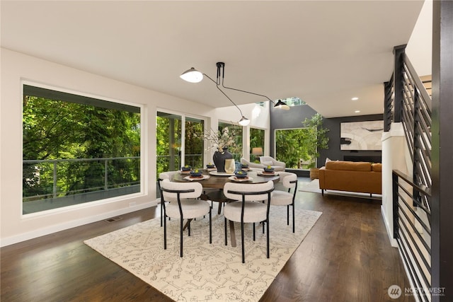 18510 NE 15th Pl, Bellevue, WA 98008 - dining area with recessed lighting, dark wood-type flooring, and baseboards