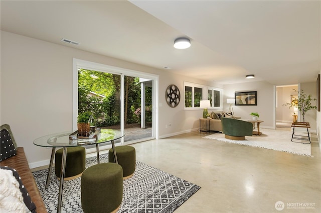 18510 NE 15th Pl, Bellevue, WA 98008 - dining room featuring finished concrete flooring and baseboards