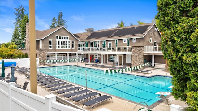 18510 NE 15th Pl, Bellevue, WA 98008 - community pool featuring a patio area