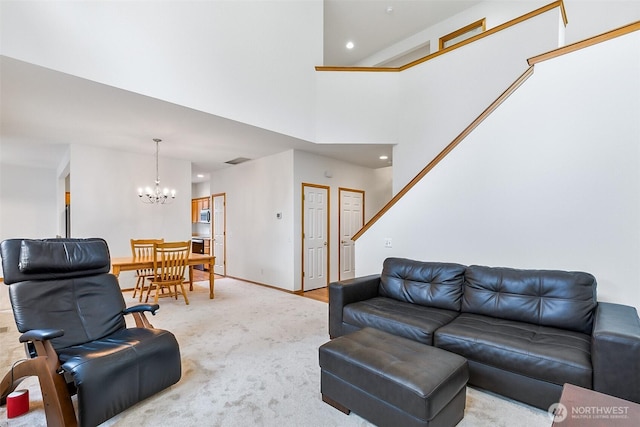 12032 38th Ave SE, Everett, WA 98208 - living room with a chandelier, recessed lighting, and a high ceiling