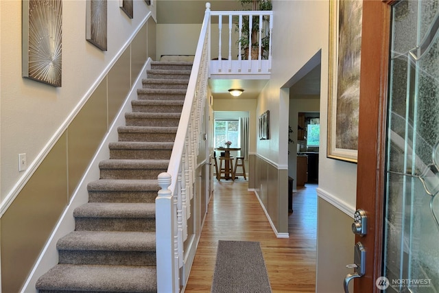 22015 SE 244th Pl, Maple Valley, WA 98038 - foyer with wood finished floors, stairs, and baseboards