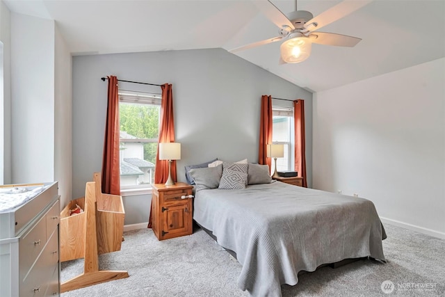 1131 115th St SW Unit M2, Everett, WA 98204 - bedroom featuring light carpet, vaulted ceiling, baseboards, and ceiling fan