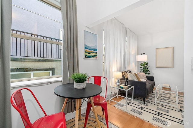 7 Harrison St Unit 26, Seattle, WA 98109 - dining room with wood finished floors and baseboards