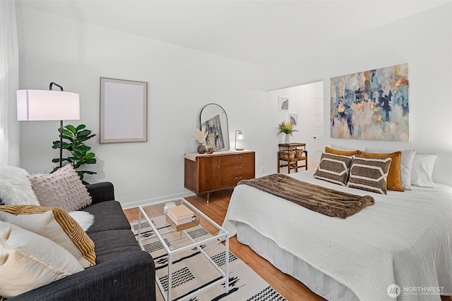 7 Harrison St Unit 26, Seattle, WA 98109 - bedroom featuring wood finished floors and baseboards