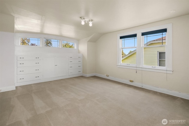 6813 17th Ave NE, Seattle, WA 98115 - bonus room with light colored carpet, baseboards, and vaulted ceiling