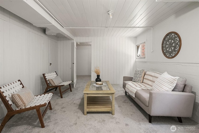6813 17th Ave NE, Seattle, WA 98115 - living area with light colored carpet, wood ceiling, and wood walls