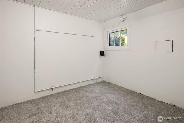 6813 17th Ave NE, Seattle, WA 98115 - spare room featuring carpet floors and wood ceiling