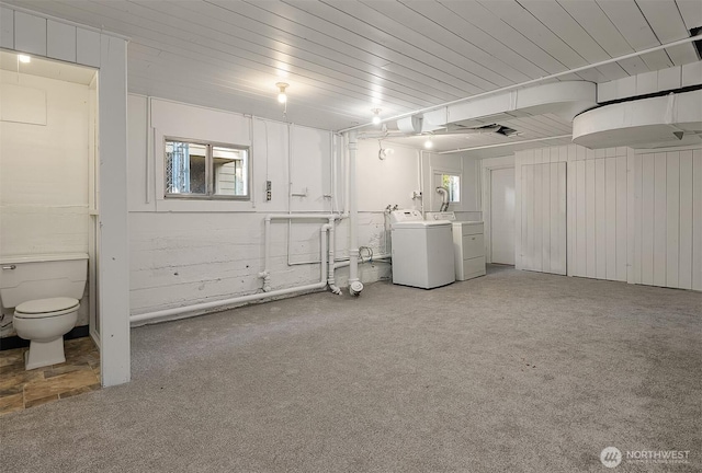 6813 17th Ave NE, Seattle, WA 98115 - below grade area featuring washer and clothes dryer, light carpet, and wood ceiling