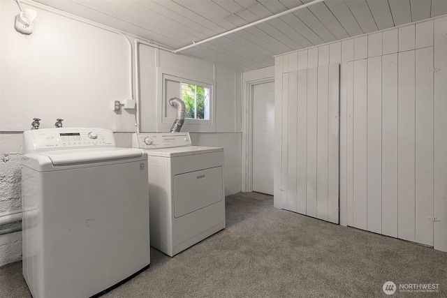 6813 17th Ave NE, Seattle, WA 98115 - laundry room with washing machine and clothes dryer and light carpet
