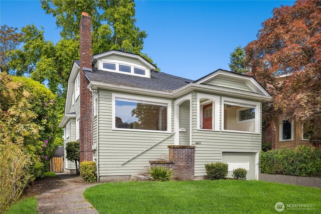 6813 17th Ave NE, Seattle, WA 98115 - bungalow-style home featuring a chimney, roof with shingles, and a front yard