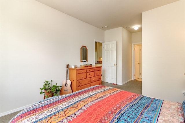 1002 9th Ave SE Unit C-201, Puyallup, WA 98372 - bedroom featuring carpet floors and baseboards