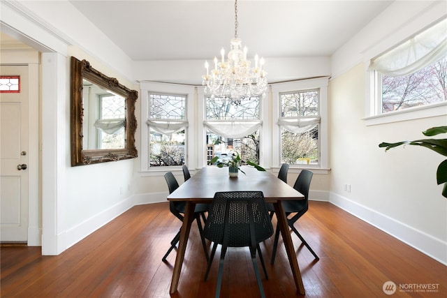 2011 E Cherry St, Seattle, WA 98122 - dining space featuring a chandelier, plenty of natural light, hardwood / wood-style flooring, and baseboards
