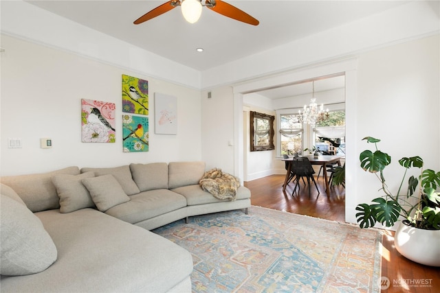 2011 E Cherry St, Seattle, WA 98122 - living room with wood finished floors, a chandelier, ceiling fan, and baseboards