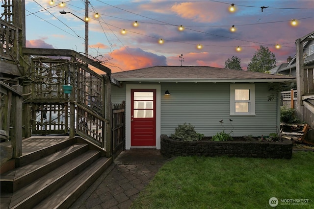 2011 E Cherry St, Seattle, WA 98122 - view of front of house with a front yard, roof with shingles, and stairway
