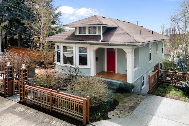 2011 E Cherry St, Seattle, WA 98122 - view of front facade featuring a porch and a shingled roof