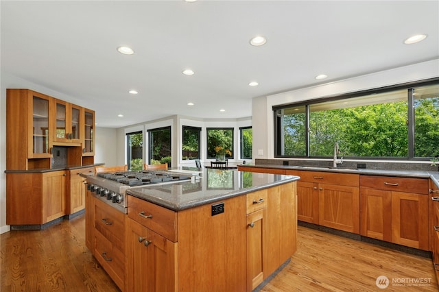 15102 93rd Pl NE, Bothell, WA 98011 - kitchen with a sink, stainless steel gas stovetop, a kitchen island, healthy amount of natural light, and recessed lighting