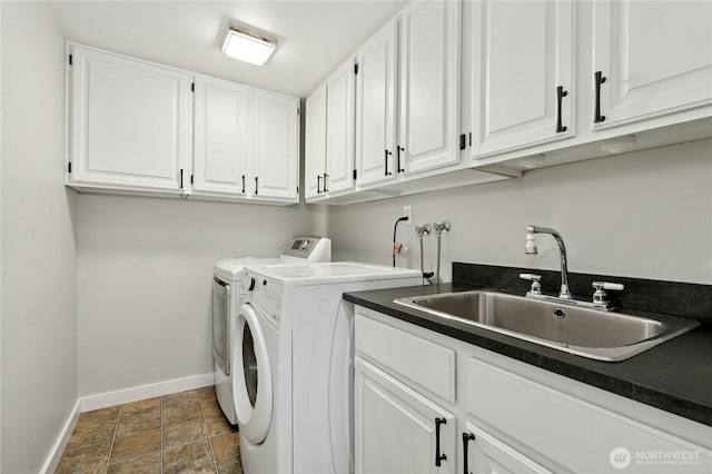 15102 93rd Pl NE, Bothell, WA 98011 - laundry area with baseboards, independent washer and dryer, cabinet space, and stone finish flooring