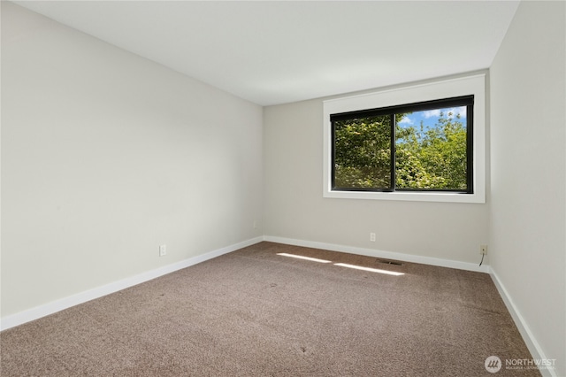 15102 93rd Pl NE, Bothell, WA 98011 - carpeted spare room featuring baseboards