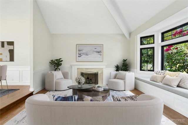 15102 93rd Pl NE, Bothell, WA 98011 - living room with wood finished floors, a premium fireplace, and wainscoting