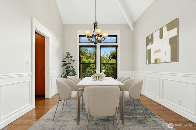 15102 93rd Pl NE, Bothell, WA 98011 - dining room with a chandelier, wood finished floors, a decorative wall, and a wainscoted wall