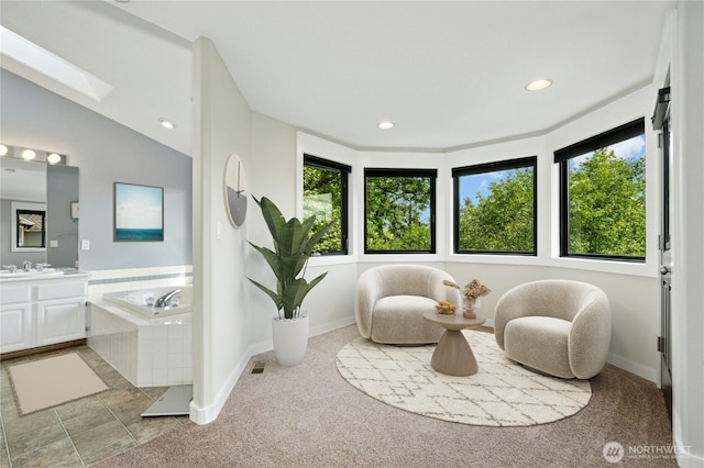 15102 93rd Pl NE, Bothell, WA 98011 - sitting room featuring carpet flooring, recessed lighting, baseboards, and a skylight