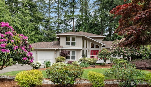 2714 Sahalee Dr E, Sammamish, WA 98074 - mid-century modern home with a garage, a shingled roof, and asphalt driveway