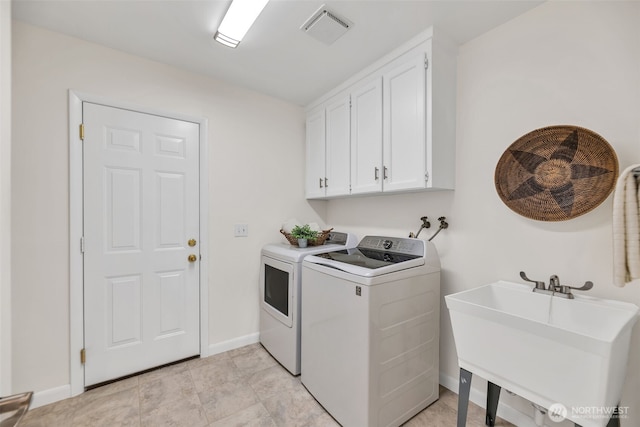 2714 Sahalee Dr E, Sammamish, WA 98074 - washroom featuring washing machine and clothes dryer, cabinet space, and baseboards