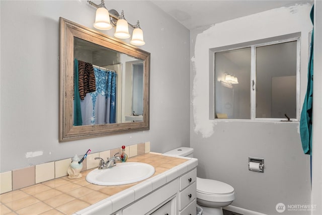 8909 Hipkins Rd SW, Lakewood, WA 98498 - full bathroom featuring toilet and vanity