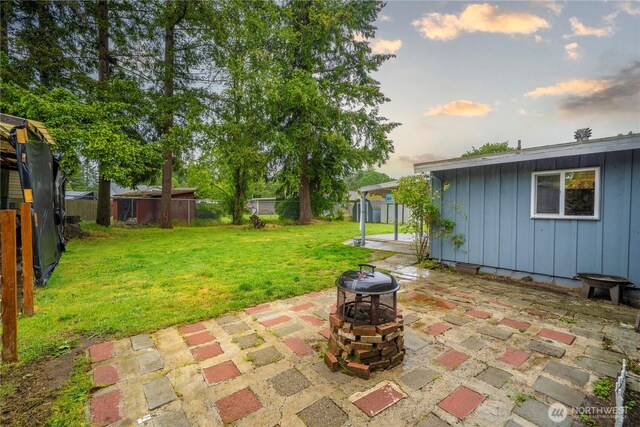 8909 Hipkins Rd SW, Lakewood, WA 98498 - view of yard with a patio area and a fire pit