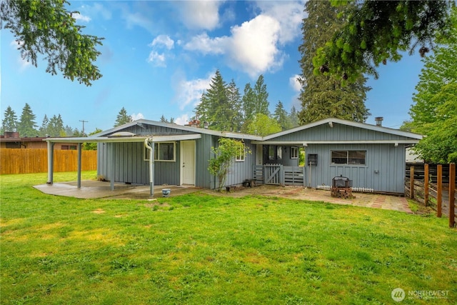 8909 Hipkins Rd SW, Lakewood, WA 98498 - rear view of property with a patio