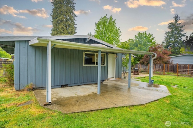 8909 Hipkins Rd SW, Lakewood, WA 98498 - exterior space with board and batten siding and a patio