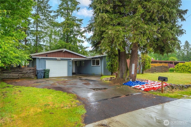 8909 Hipkins Rd SW, Lakewood, WA 98498 - ranch-style home with driveway and an attached garage