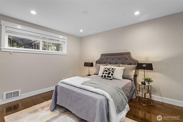 315 10th Ave S Unit 101, Kirkland, WA 98033 - bedroom with baseboards, wood finished floors, and recessed lighting