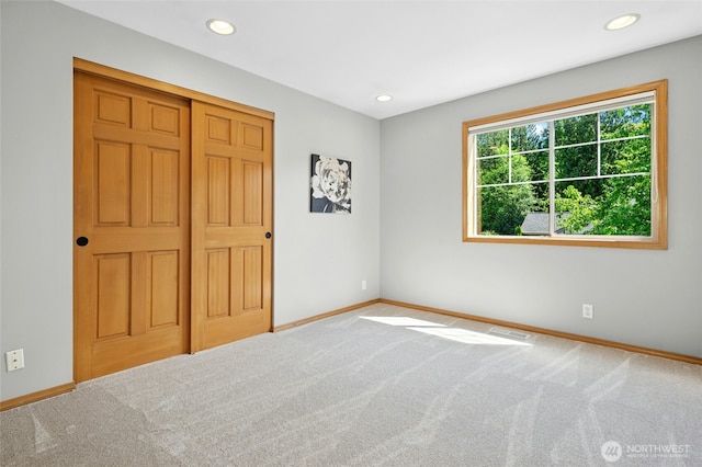 32910 NE 40th Pl, Carnation, WA 98014 - unfurnished bedroom featuring carpet, baseboards, recessed lighting, and a closet