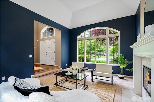 2110 216th Pl NE, Sammamish, WA 98074 - living area featuring high vaulted ceiling, baseboards, carpet floors, and a premium fireplace
