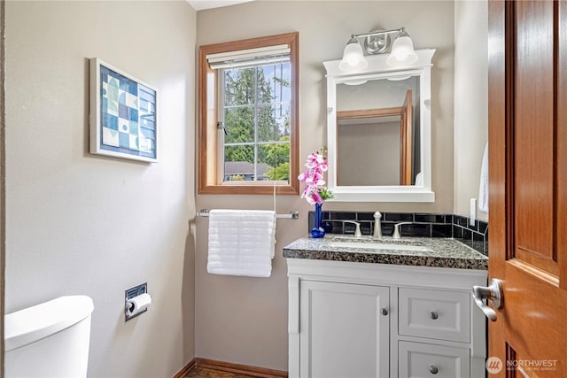 2110 216th Pl NE, Sammamish, WA 98074 - half bathroom with toilet, vanity, and baseboards