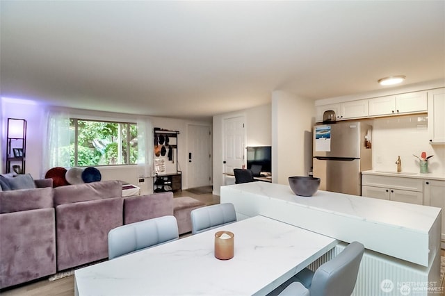 3834 175th Ave NE Unit G16, Redmond, WA 98052 - dining room with light wood-type flooring