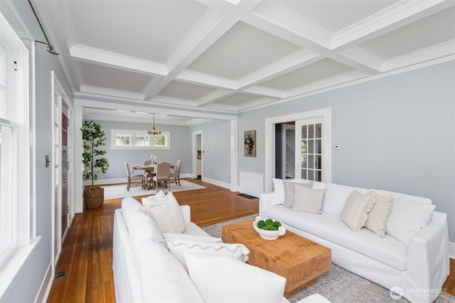 2828 Sunset Dr, Bellingham, WA 98225 - living room featuring coffered ceiling, dark wood-type flooring, a chandelier, beamed ceiling, and ornamental molding