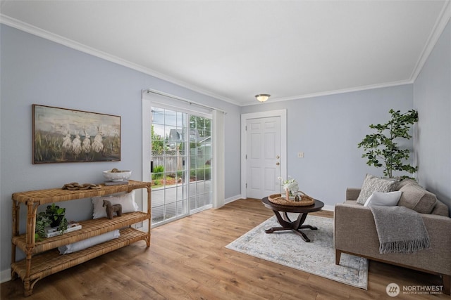 2828 Sunset Dr, Bellingham, WA 98225 - living area featuring crown molding, wood finished floors, and baseboards