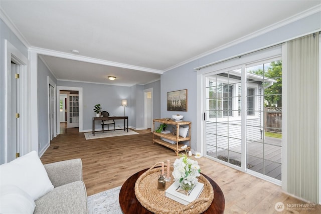 2828 Sunset Dr, Bellingham, WA 98225 - living area with wood finished floors, crown molding, and baseboards