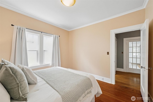 2828 Sunset Dr, Bellingham, WA 98225 - bedroom with ornamental molding, wood finished floors, and baseboards