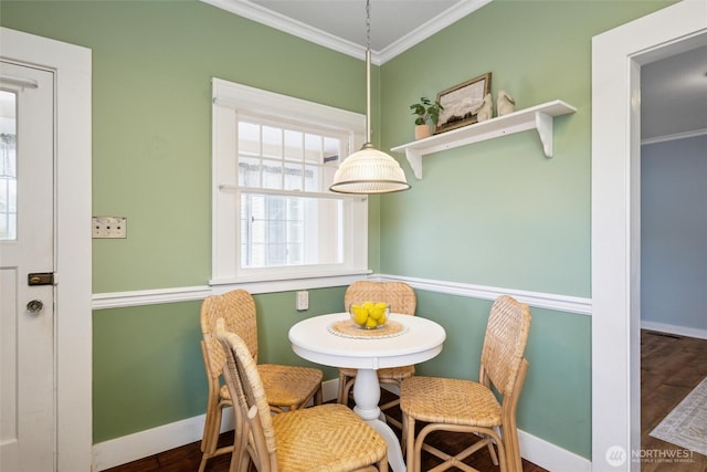 2828 Sunset Dr, Bellingham, WA 98225 - dining space with crown molding, baseboards, and wood finished floors
