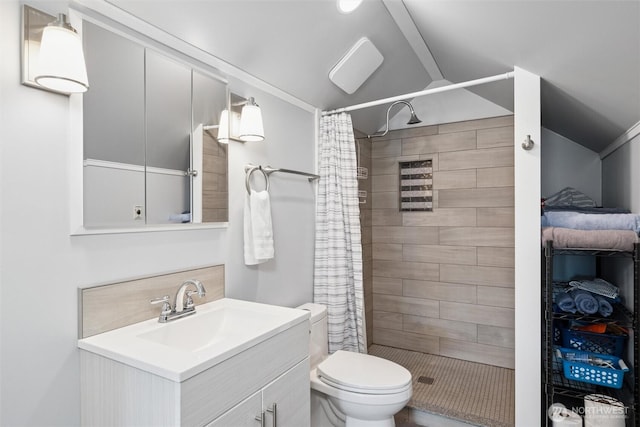 2828 Sunset Dr, Bellingham, WA 98225 - bathroom with vanity, lofted ceiling, tiled shower, and toilet