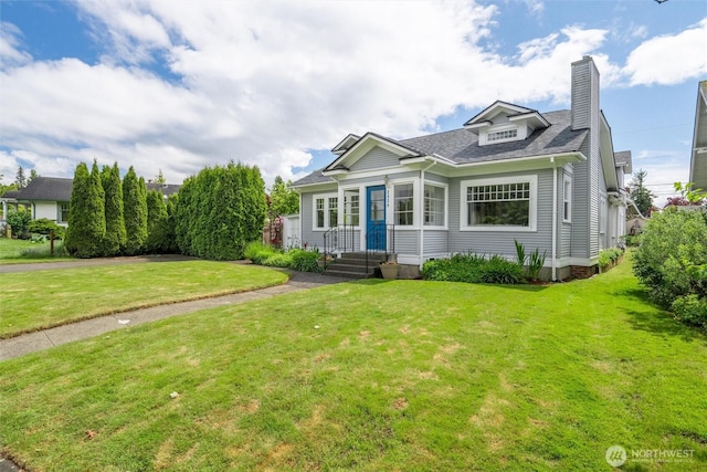 2828 Sunset Dr, Bellingham, WA 98225 - view of front of house featuring a front lawn, a chimney, and roof with shingles