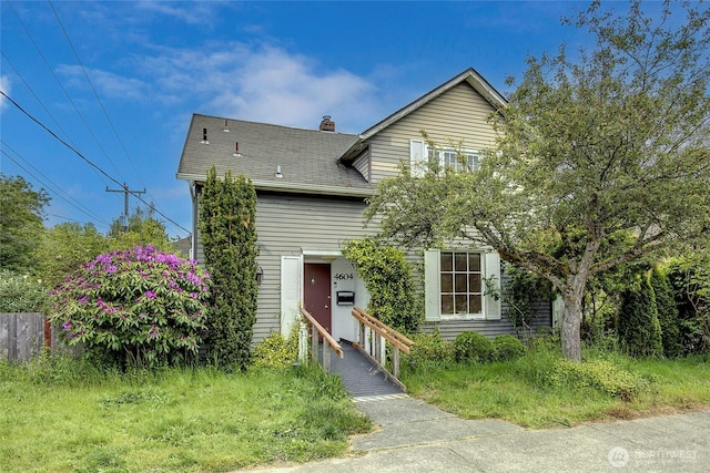 4604SW Lander St, Seattle, WA 98116 - view of front of property featuring a chimney and a shingled roof