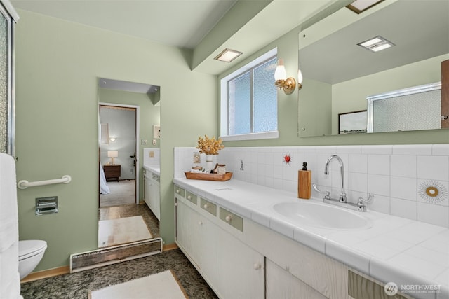 13008 Riviera Pl NE, Seattle, WA 98125 - bathroom with connected bathroom, toilet, vanity, and an enclosed shower
