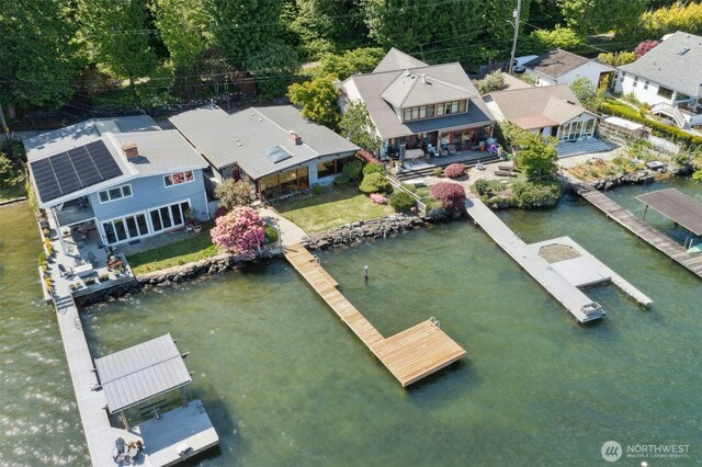 13008 Riviera Pl NE, Seattle, WA 98125 - aerial perspective of suburban area with a large body of water