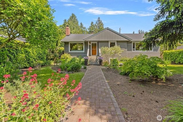 7510 Fauntleroy Way SW, Seattle, WA 98136 - view of front facade featuring a chimney