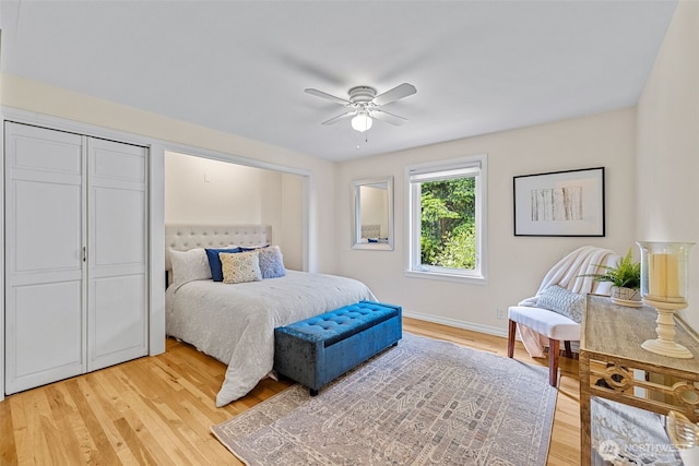 7510 Fauntleroy Way SW, Seattle, WA 98136 - bedroom with light wood-style flooring, ceiling fan, and baseboards